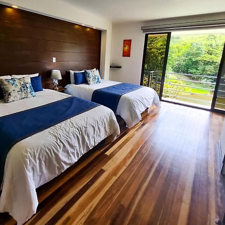Burbi Lake Lodge Monteverde Buitenkant foto
